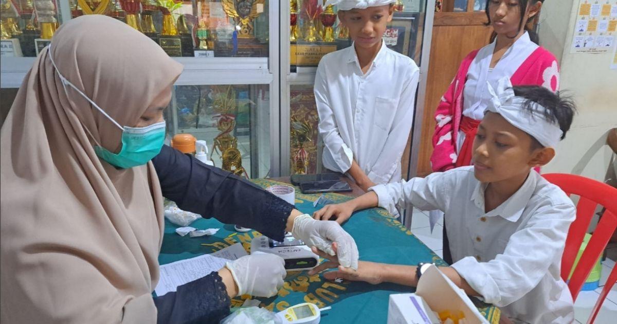 Pemberian Imunisasi HPV dan Cek Kesehatan Gratis untuk Kelas IX SLUB